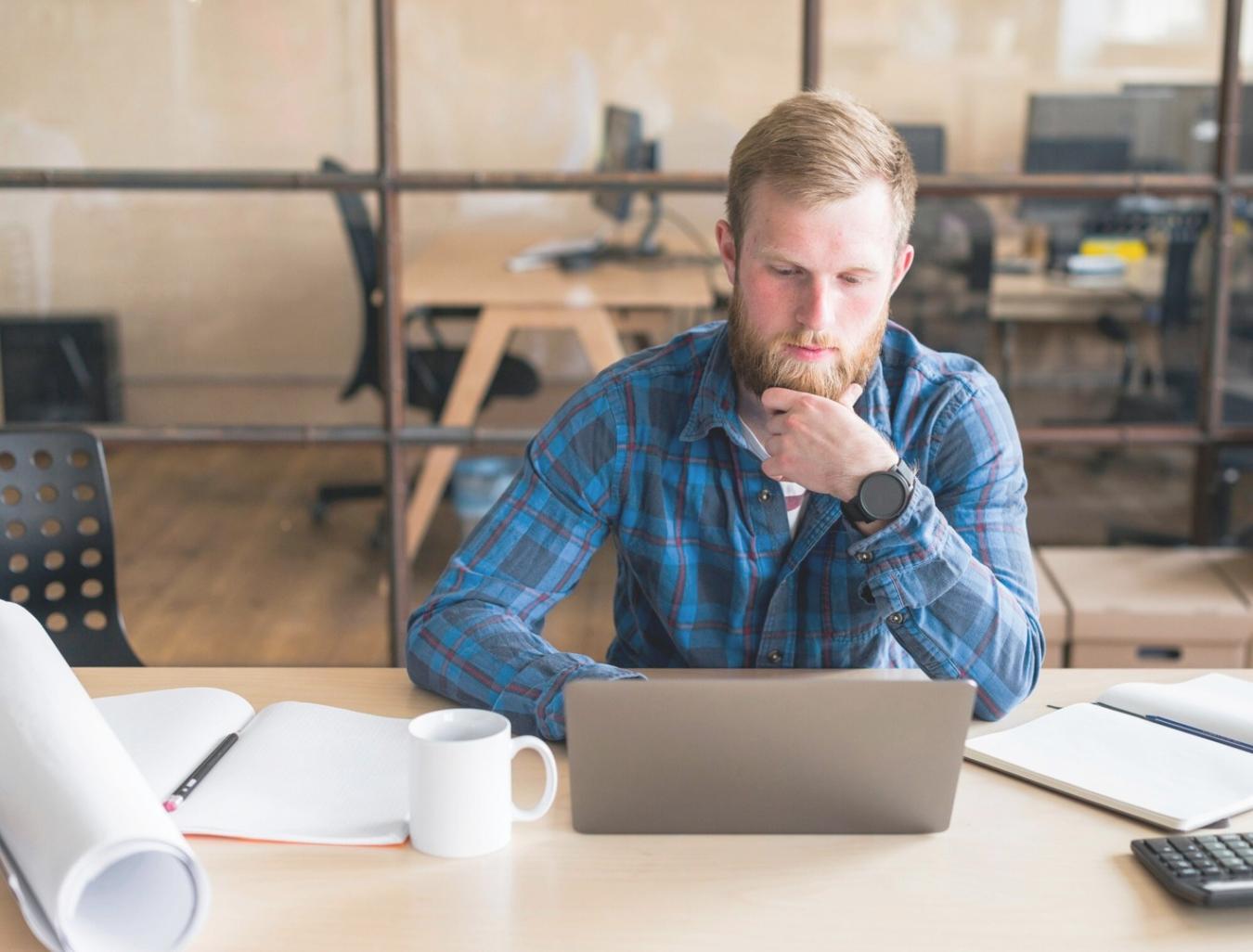 Business team reviewing financial analysis documents during strategic planning session